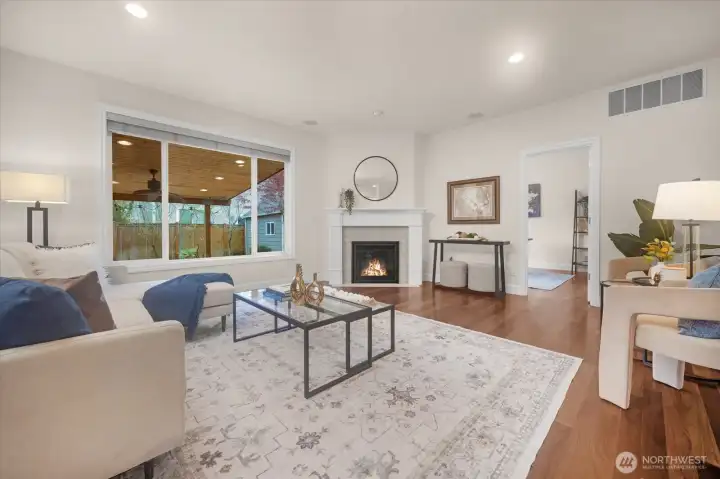 The family room is located off the kitchen and is expansive yet cozy, featuring a new gas fireplace for the chilly winter evenings.