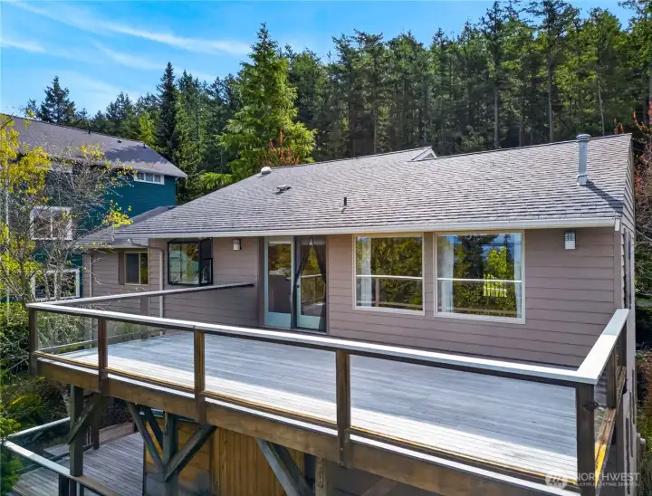 Large main level deck; lower level deck with sauna.