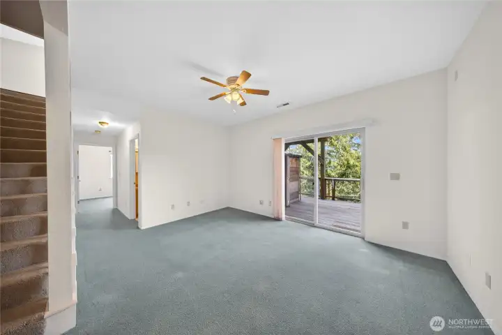 Come downstairs to the lower level. This could be an office or family room.  Enjoy the second deck and sauna.