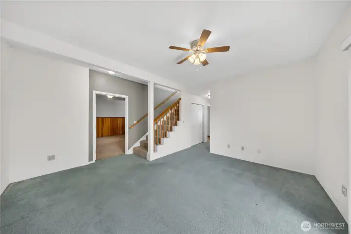 One of two lower level bedrooms is through the door.