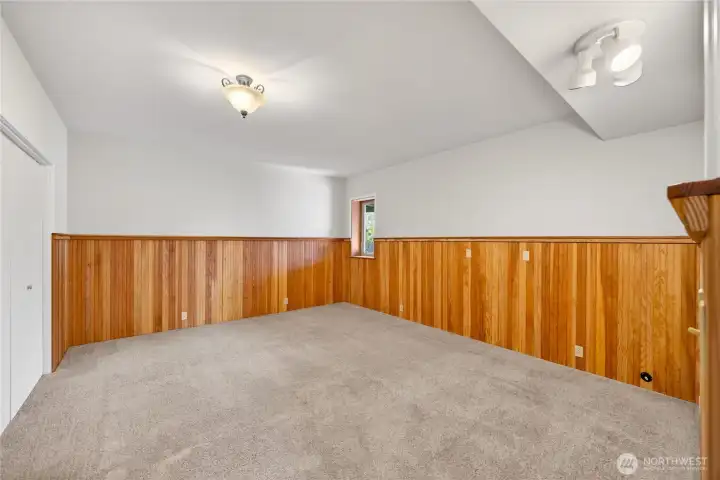Large bedroom with beadboard.