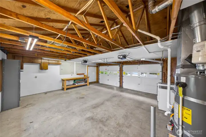Two car garage with lots of room for hobbies.