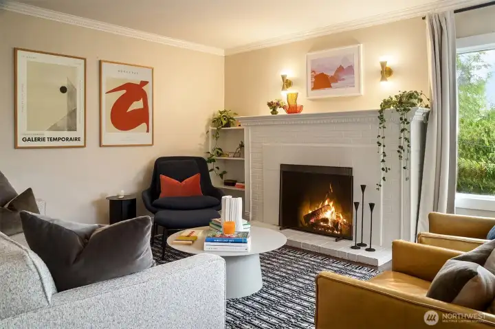 Sit back and stay for a while.  The living room is elegant and easy with peek-a-boo views an a wood-burning fireplace.