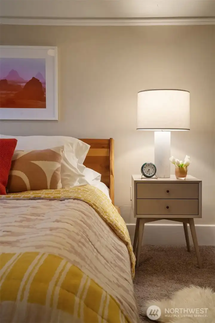 The lovely primary bedroom is spacious and light with room to move.