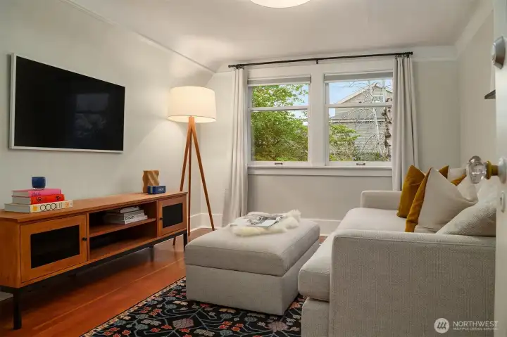 The third upstairs bedroom is a perfect tv room, bedroom or office.