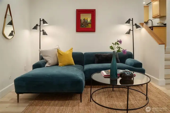 Soaring ceilings in the loft like living room in the lower level.