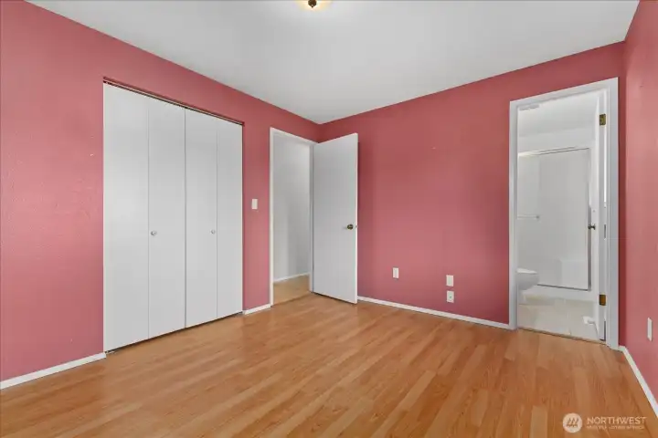 Primary bedroom with attached bathroom.