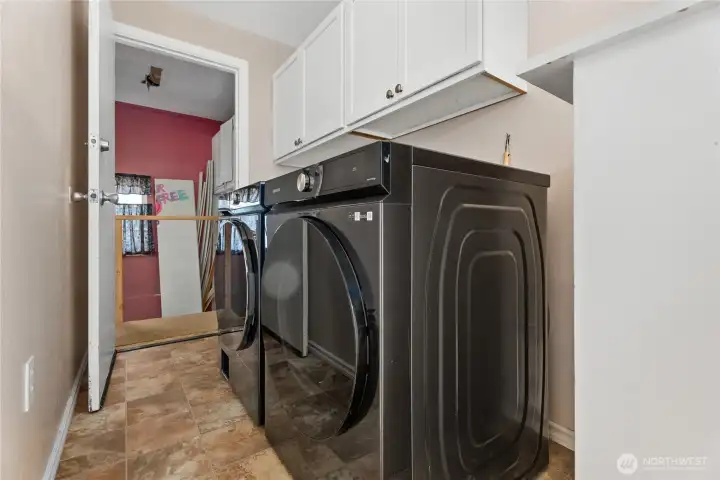 Utility room between the garage and dining room.