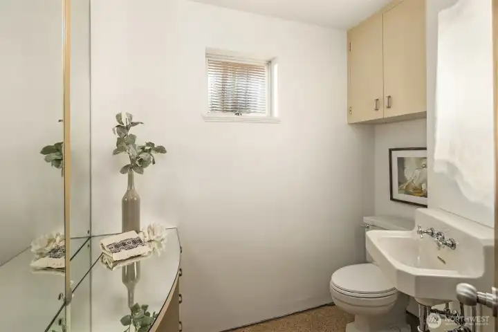 Powder room off the entry.
