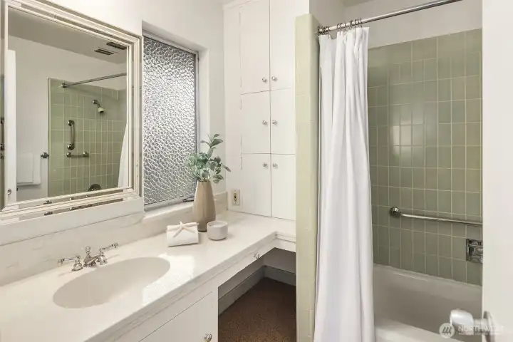 The original primary bathroom with room to remodel and push into the bedroom for expansion-if wanted?