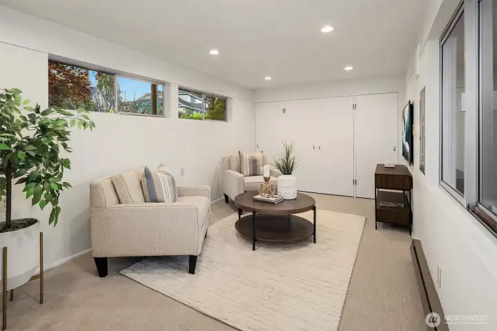This is the family room.  It can also be used as a legal bedroom or a home office or Recreation room.