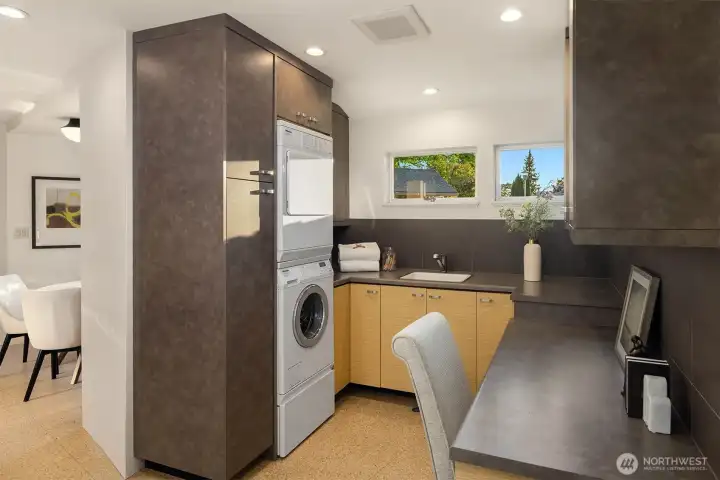 The laundry room. There is a storage room right next to this room-(not pictured)