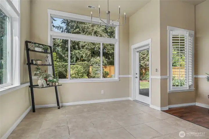 Dining area with peaceful views and easy access to the patio.