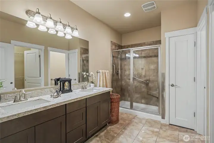 Primary bathroom attached to primary bedroom.