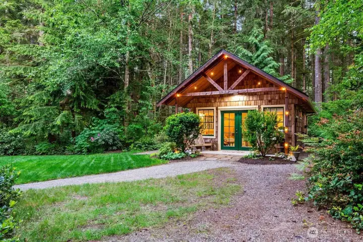 Welcome to the detached guest cottage...the perfect retreat to rest, create or offer multi-generational living tucked away in a private corner on this 3.6 acre property.