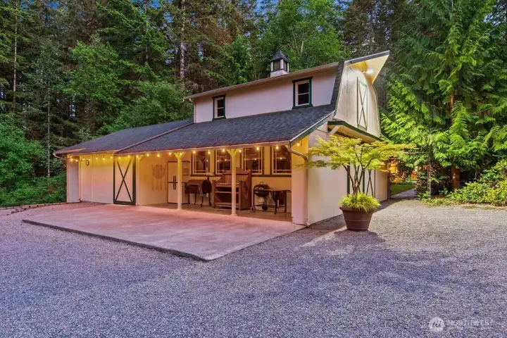 Covered patio area built into garage/shop makes for the ultimate year 'round BBQ'n station!