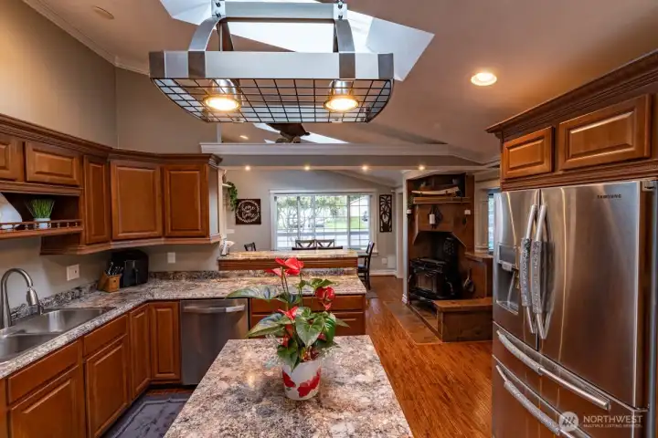 Plenty of room and cabinets in the kitchen. Pot rack also Plenty of room and cabinets in the kitchen. Pot rack also