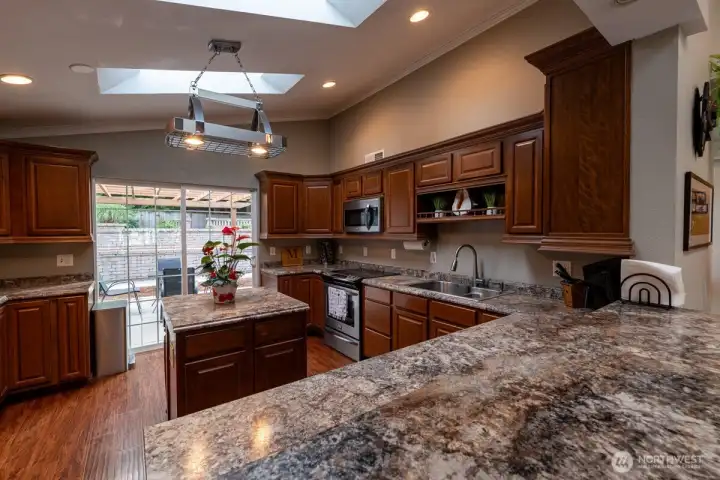 Two skylights add natural light to the kitchen. Two skylights add natural light to the kitchen.