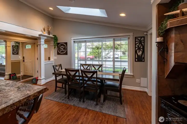 Dining room with large picture window. Dining room with large picture window.