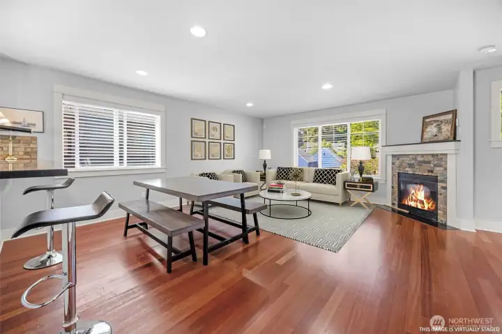 Virtually staged photo of dining and living areas