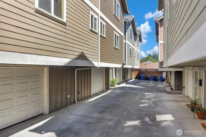 Unit garage in this photo is the closest one to the left