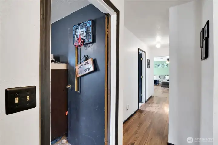 Down the hall to the bedrooms and the living room. Down the hall to the bedrooms and the living room.