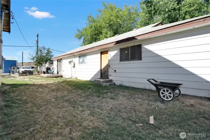 Fenced side of home. Fenced side of home.