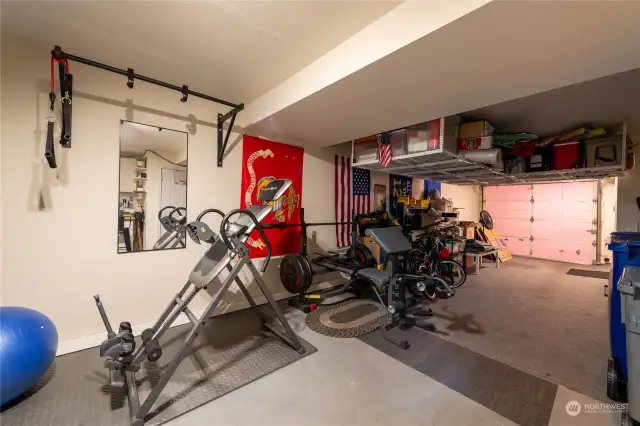 Tandem garage allow for covered parking and storage.  Ceiling storage can be purchased from current owners...otherwise it conveys with seller.