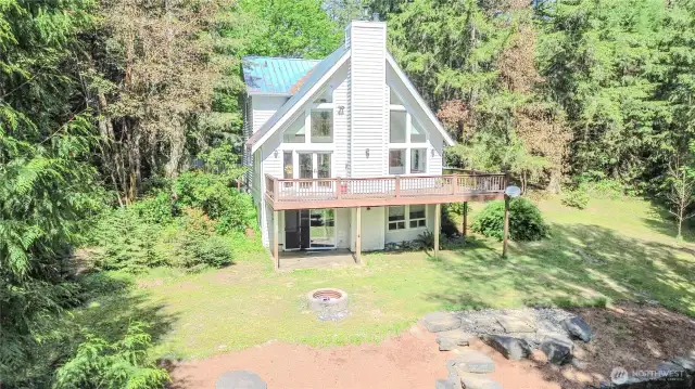 forest with plenty of lawn and bottom porch for bbq's
