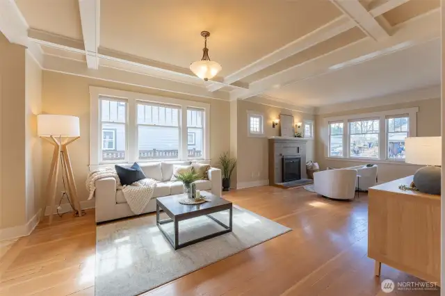Hardwood floors and ceiling detail add so much warmth