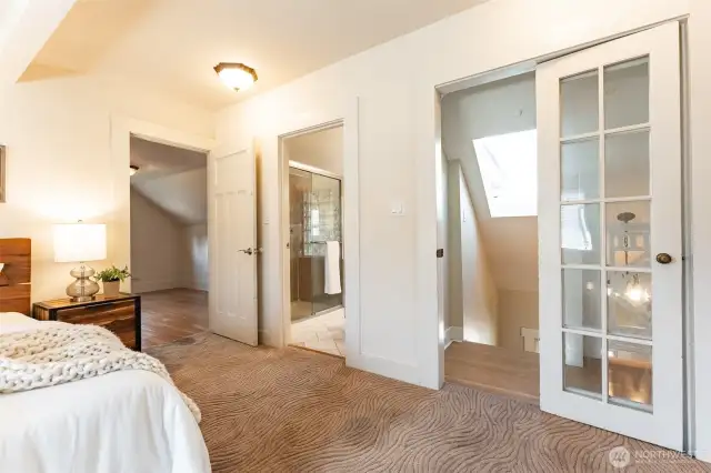 Upstairs space can be lived in as one large primary suite or two separate bedrooms with flex space