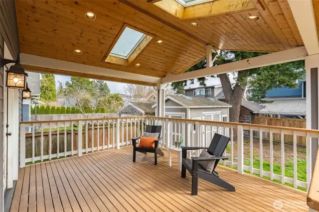 Skylights bring in light, tongue and groove ceiling and can lights.