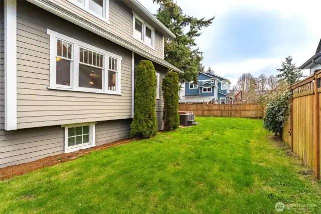 Side yard with direct gate access to the driveway provides options for future garage. Seller has architectural plans for future development option.
