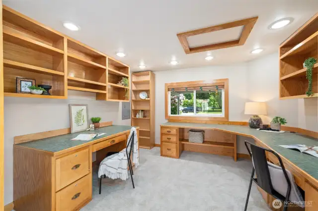 Main house office with two built in custom desks and shelving