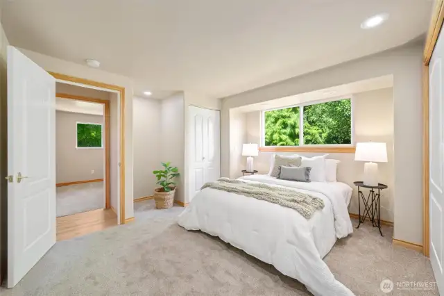 Main house primary bedroom with dual closets