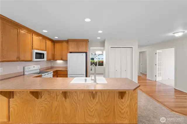 Kitchen w/Eating Bar, Cabinets to the Ceiling, Tile Backsplash and Pantry!