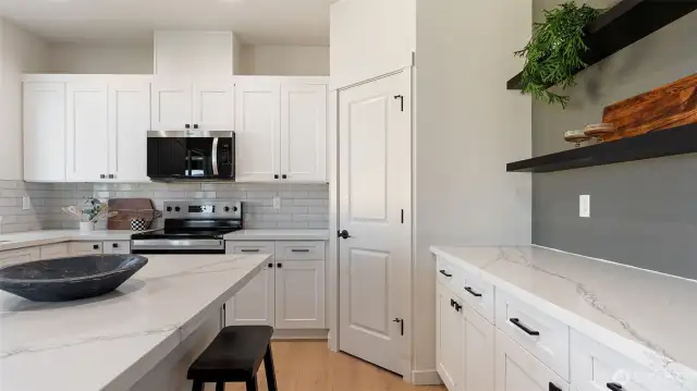 Kitchen has walk in pantry.