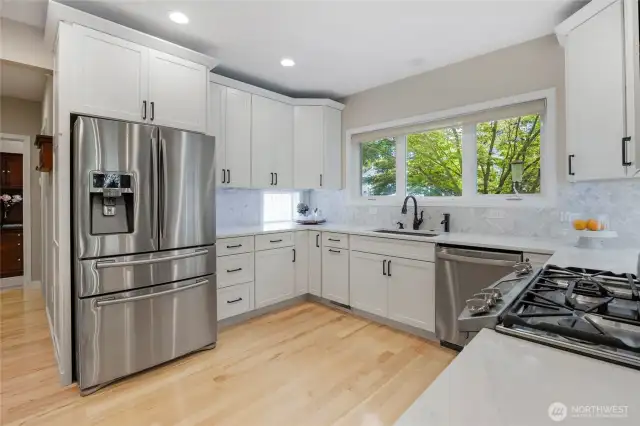 A large walk-in pantry is located next the kitchen, as well as large storage cabinets located in the kitchen as well.