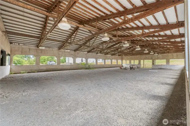60'X120" covered riding arena w/4 stalls to the left just outside of picture with hay storage upstairs.