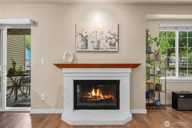 Cozy wood-burning fireplace.