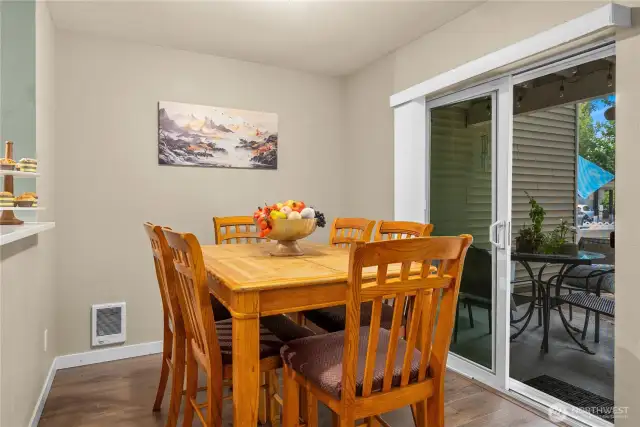 Dining area opens to a covered patio.