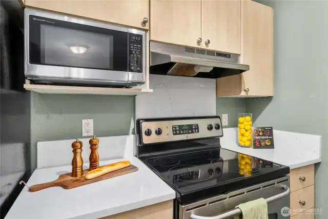 Kitchen with SS appliances.