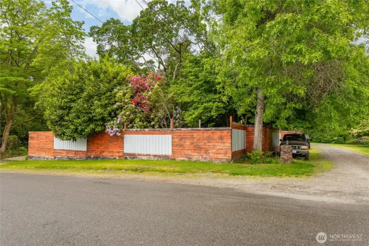Fully fenced home sitting on a shy half acre. You will feel secluded with the tall fencing, but have convenient access to shopping, schools and popular local parks.