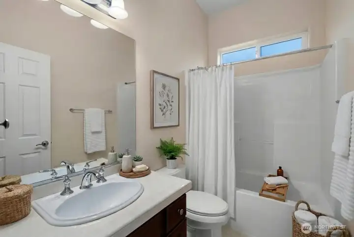 Full second bathroom conveniently located near the second bedroom.