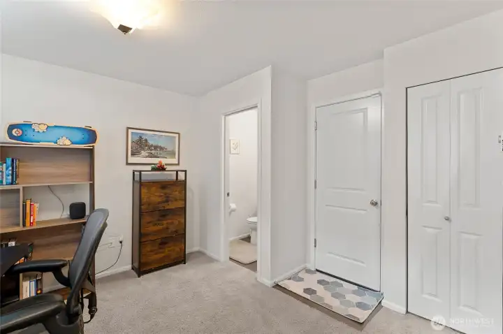 door leads to garage with an EV charger