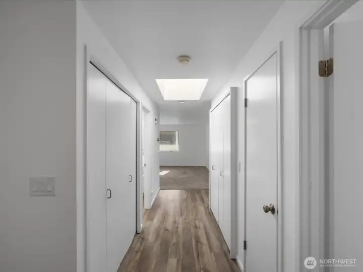 Hall front front door with large skylight to bring in lots of natural light.