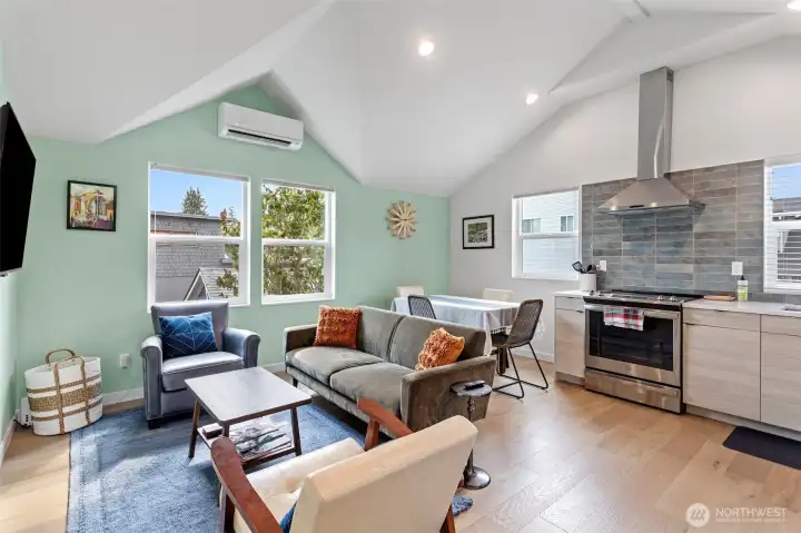 Cozy kitchen with SS appliances and engineered hardwoods.