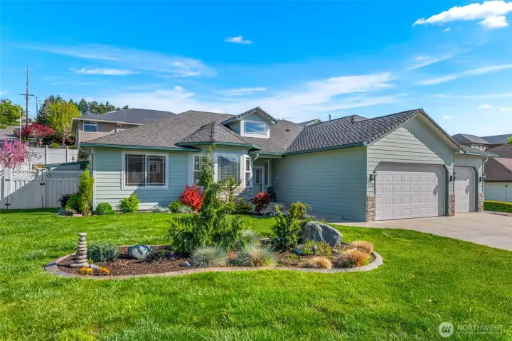 Concrete curbing and professionally landscaped