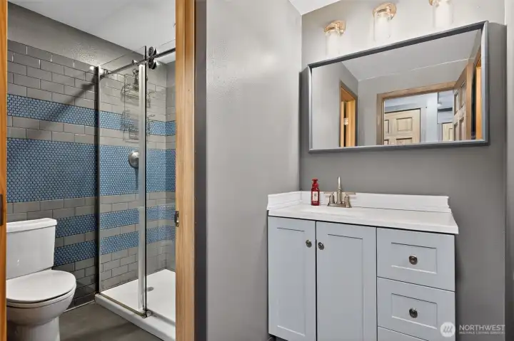 Main bath on upper level.