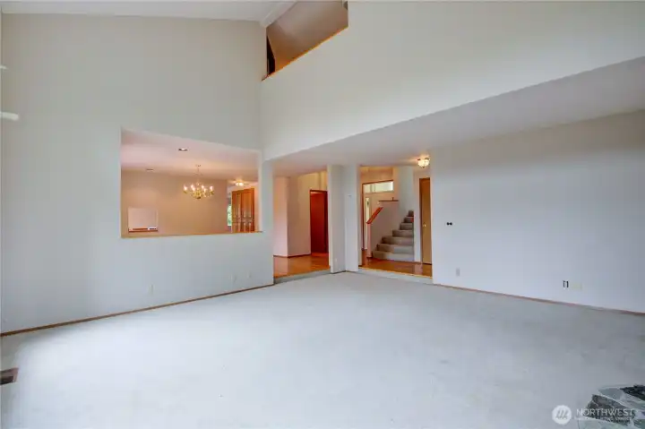 Huge livinging room with wood burning fireplace, notice the loft above Huge livinging room with wood burning fireplace, notice the loft above